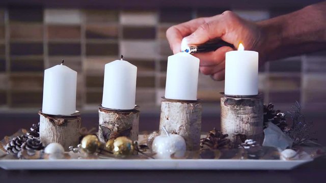 The candles on the Advent wreath are lit every Sunday according to tradition