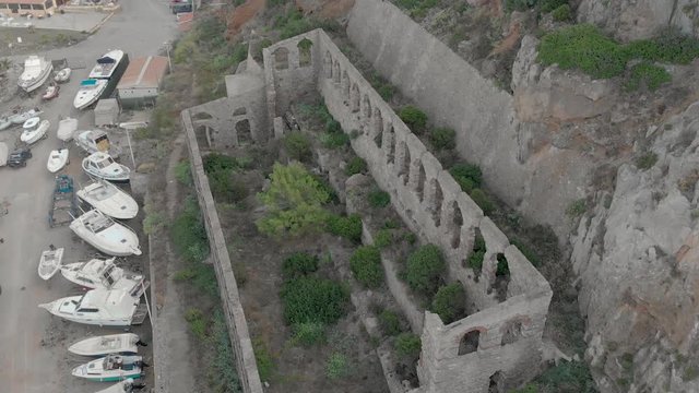 Beautiful and overgrown Church remains, Buggerru, Sardinia, Aerial view