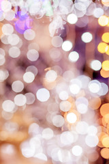 Festive blur background. Abstract twinkled bright background with bokeh defocused golden lights