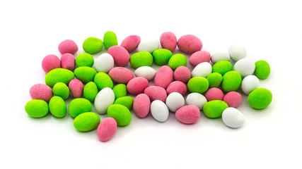 Colorful round peanut candy coated on a white isolated background