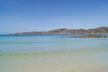 The bay next to Achmelvich beach on a sunny day in the Scottish highlands