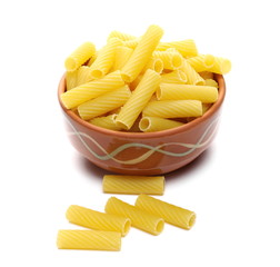 Pasta tubes, tortiglioni or elicoidali in clay pot, isolated on white background