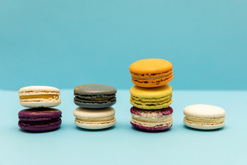 Few stacks of macaroon cakes to illustrate a jump in blood sugar levels when consuming carbohydrates