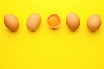 Fresh eggs on color background