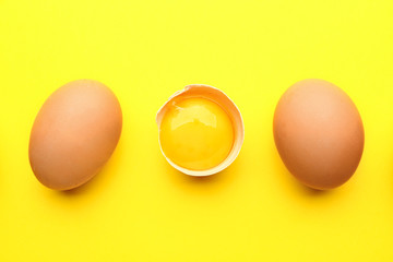 Fresh eggs on color background