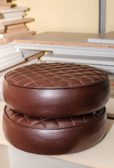 Seat upholstery in a furniture workshop, eco-leather cover