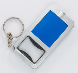 Blue key ring that is also a bottle opener