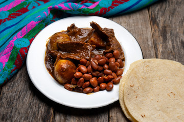 Mexican beef steak with potatoes and pasilla pepper sauce