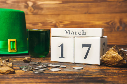 Composition for St. Patrick's Day on wooden background