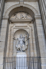 Fragments of Paris Saint-Sulpice church (Eglise Saint-Sulpice, 1754) facade. Saint-Sulpice church is one of biggest churches in Paris. Saint-Germain-des-Pres district, Paris, France.