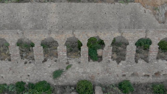 Beautiful and overgrown Church remains, Buggerru, Sardinia, Aerial view