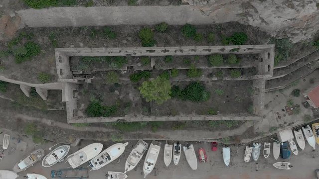 Beautiful and overgrown Church remains, Buggerru, Sardinia, Aerial view