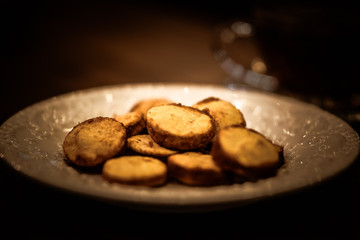 Tea cups with thin cream wafers. Teas with hot smoke. Fine cookies with accompanying special teas.