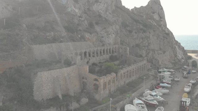 Beautiful and overgrown Church remains, Buggerru, Sardinia, Aerial view
