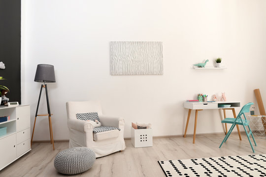 Modern child room interior with stylish furniture
