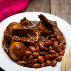 Mexican beef steak with potatoes and pasilla pepper sauce