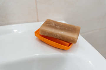 Bar of soap on the sink close-up