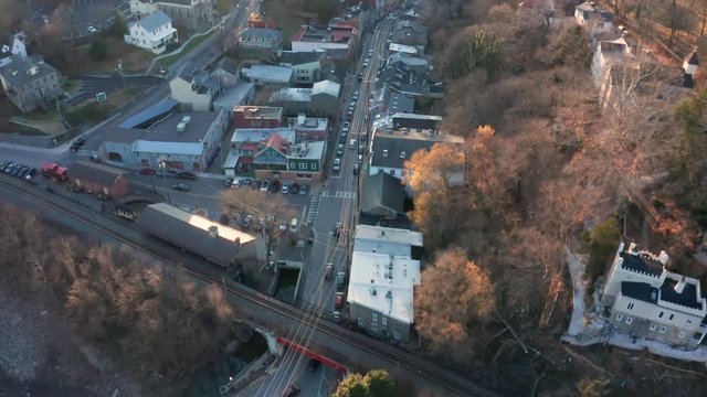 Aerial drone footage of Old Ellicott City, Maryland taken during the winter at sunset