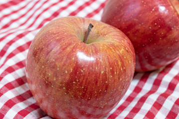 red apple on black background
