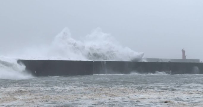 Large Waves Surge Over Sea Wall During Hurricane Landfall - Halong