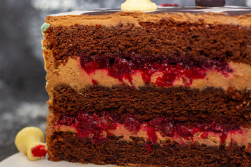 Brown cake with chocolate bisquit and chess piece