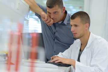 teacher and student talking in science lab