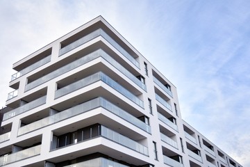 Modern and new apartment building. Multistoried modern, new and stylish living block of flats.