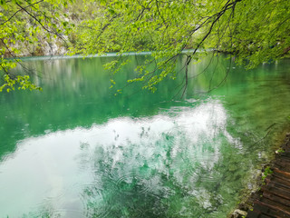 Waterfal, lake, cascades, canyon and wooden bridge in Plitvice Lakes National Park, one of the...