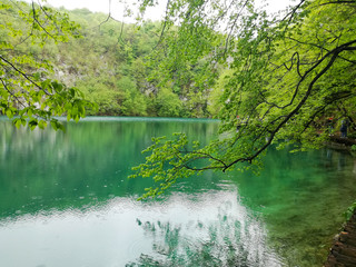 Waterfal, lake, cascades, canyon and wooden bridge in Plitvice Lakes National Park, one of the oldest and largest national parks in Croatia, ex Yugoslavia