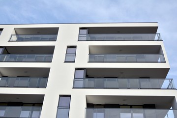 Modern and new apartment building. Multistoried modern, new and stylish living block of flats.