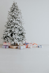 Xmas new year gifts and toys tree winter background