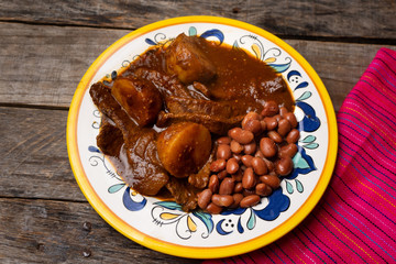 Mexican beef steak with potatoes and pasilla pepper sauce