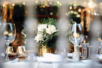 Close up photo of festive decor on the table. Bokeh
