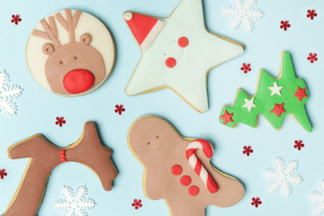Flat lay of gingerbread Christmas cookies, Winter holidays decorated biscuits, cute royal icing cookies