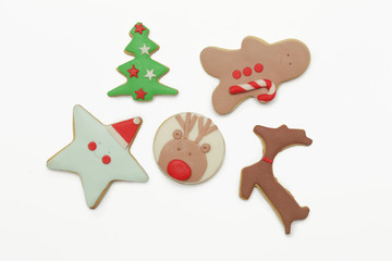 Obraz na płótnie Canvas Flat lay of gingerbread Christmas cookies, Winter holidays decorated biscuits, cute royal icing cookies