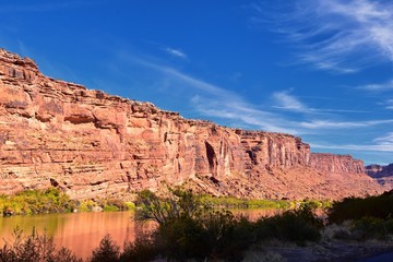 Fototapeta na wymiar Moab Panorama views of Colorado River Highway UT 128 in Utah around Hal and Jackass canyon and Red Cliffs Lodge on a Sunny morning in fall. Scenic nature near Canyonlands and Arches National Park, 