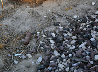 Can a trash next to  railroad tracks