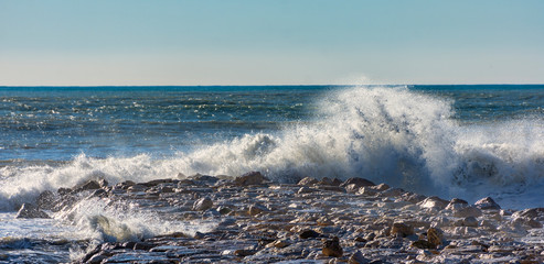 Wave storm on the breakwater