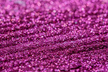 Pink and purple glitter, Defocused abstract holidays lights With Sparkle for background.