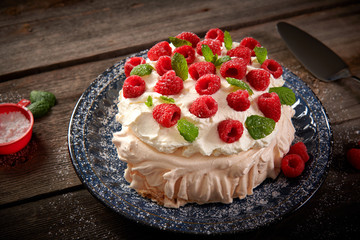 Merigue cake also called pavlova cake with fruits