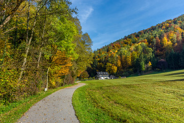 Autumn landscape with small house and colorful trees near Graz, Styria region, Austria