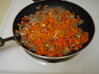 fries rice in a skillet
