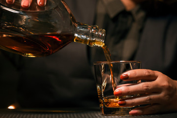 Bartender Serve Whiskey, on wood bar