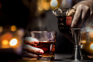 Bartender Serve Whiskey, on wood bar