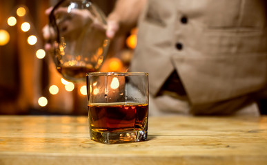 Bartender Serve Whiskey, on wood bar,