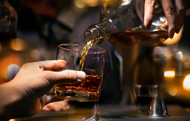 Bartender Serve Whiskey, on wood bar