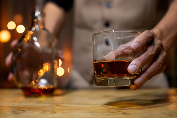 Bartender Serve Whiskey, on wood bar
