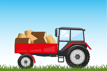 Tractor with basket ahead of laden firewood