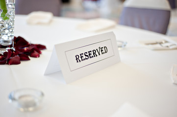 reserved sign on table