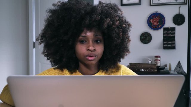 Young Black Woman IT Professional Coding On Computer